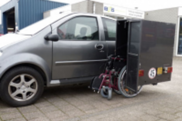 Beeld van: Brommobiel met rolstoelbox
