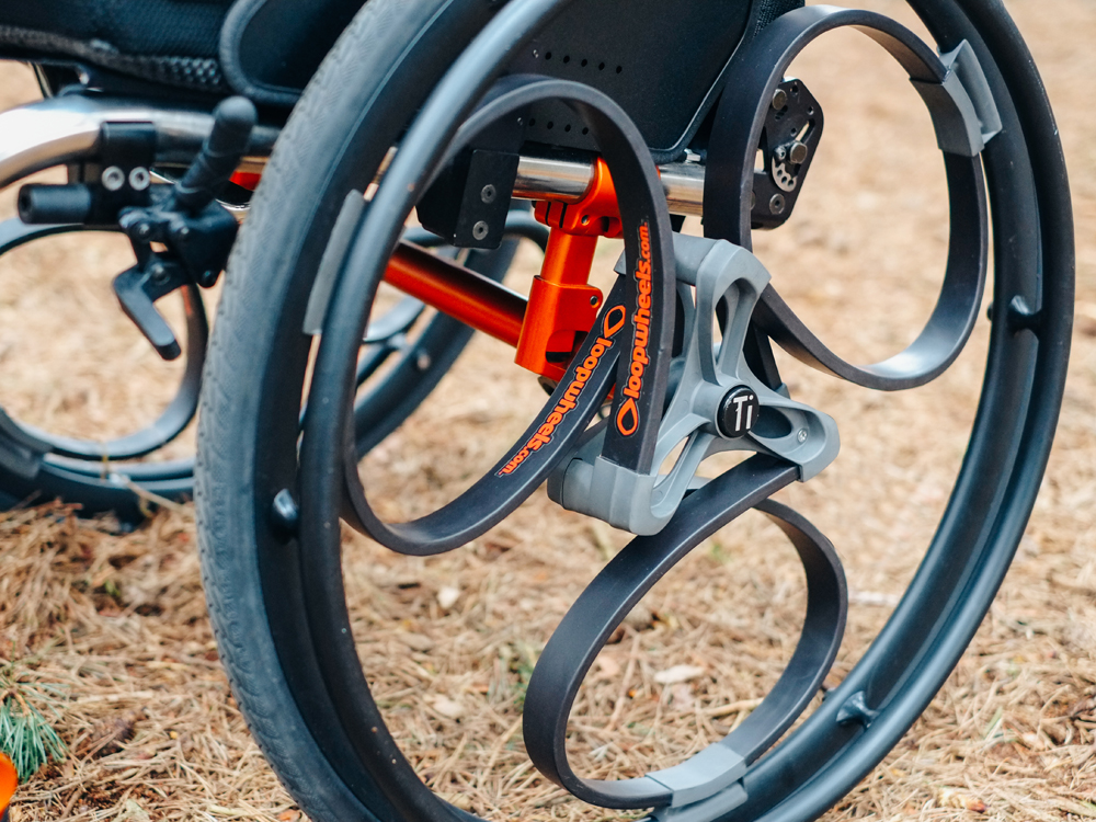 Volledig beeld van: Verende rolstoelwielen